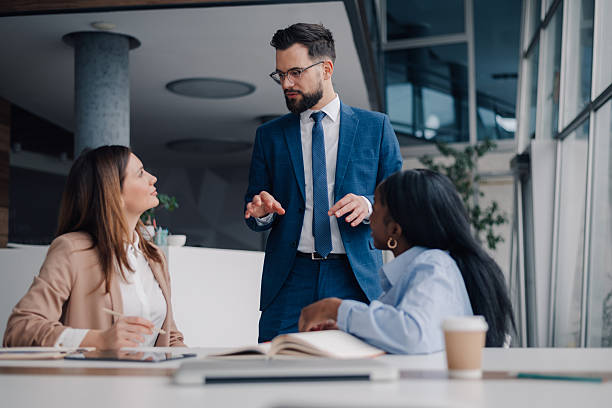 istock Business team discussing strategy in modern office 2208547847