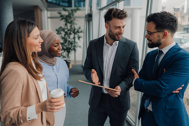 istock Business team discussing work strategy in modern office 2208547902