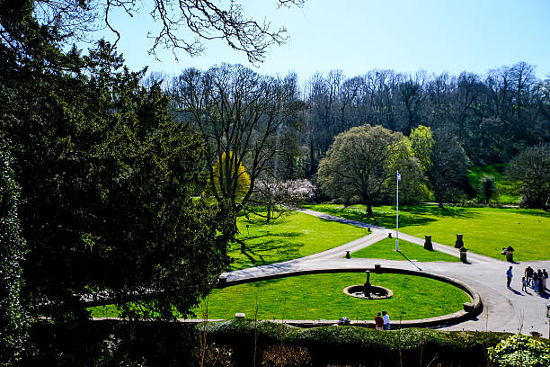 Castle Combe, Chippenham, Cotswolds, UK - 01.04.2025. The Manor House hotel is an idyllic 17th century hotel nestled in the picturesque Cotswold Village of Castle Combe in Wiltshire. View of the garden, territory from stairs.