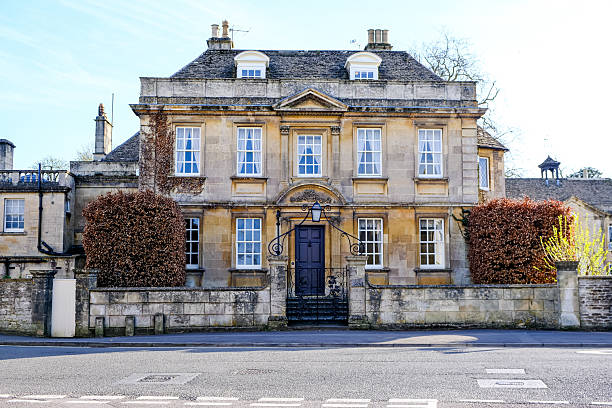 Corsham, Cotswolds, Wiltshire, England, UK - 31.03.2025. Pickwick Road view and charming Georgian house facade.
