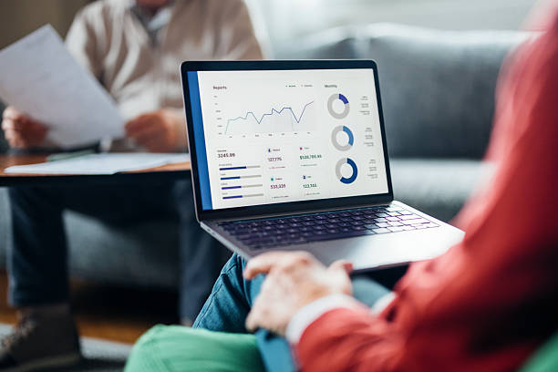 istock Close-Up of Business Data on Laptop Screen in Office Environment 2208551256