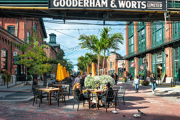 Toronto, Canada - May 28 2022: Distillery District, former Gooderham & Worts Distillery. Historic district with stores, cafes and restaurants