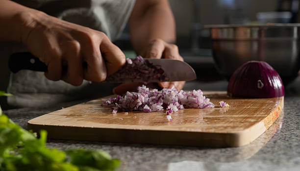 istock Woman cocking guacamole in Mexico 2208560388