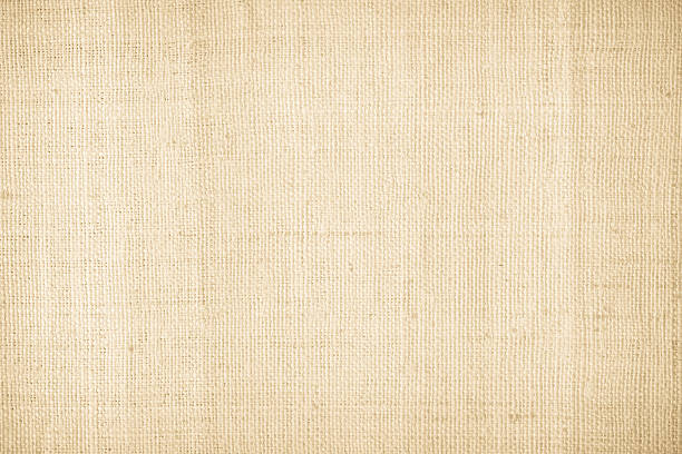 istock Brown sackcloth woven texture background in natural pattern. Jute hessian burlap, linen background in light beige cream color blank. Weaving canvas fiber line cotton cloth textured as organic. 2208562036