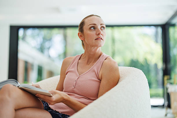 istock Focused Recovery Journaling at Rehab Center 2208562657