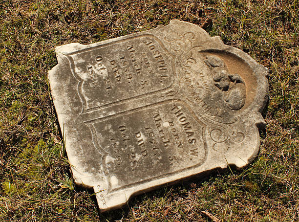 This is a blank grey praying hands gravestone.