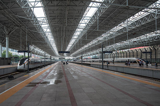 Beijing, China - August 15, 2024: Passengers on the platform of Beijing North Railway Station