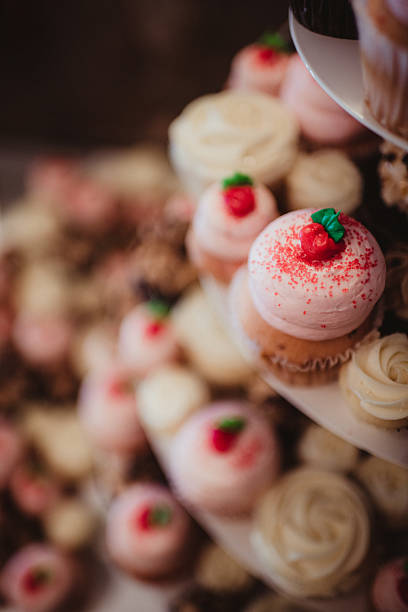 Pink cupcakes in a display case