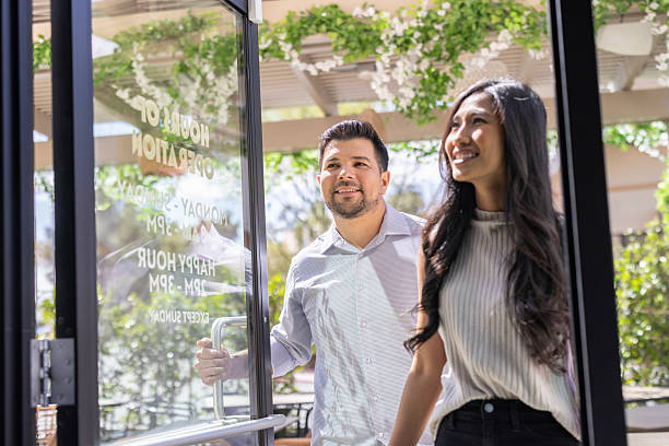 istock Couple at coffee shop 2208593405