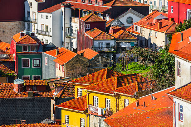 istock Old architecture with red tile rooftops in Porto, Portugal. 2208602089