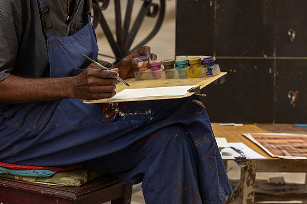 Street artist painting