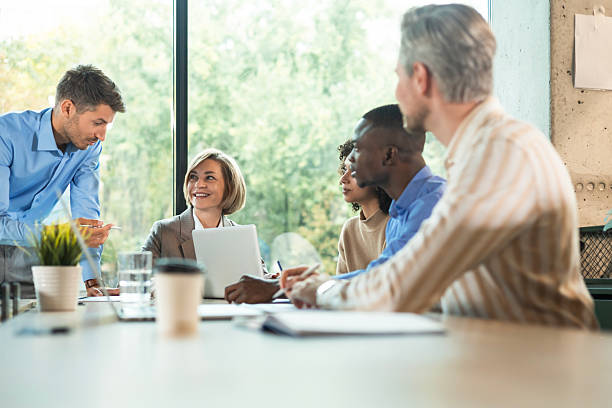 istock Business team discussing together business plans in office. 2208616705