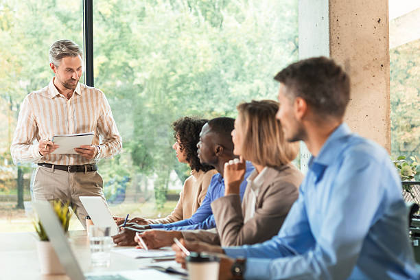istock Business meeting - manager discussing work with his colleagues. 2208616769