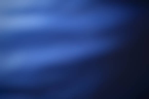 istock Abstract blurred background, dark blue, denim, berry tones. Dark and light, wavy, smooth, softness. 2208618295