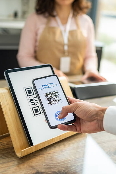 istock Man Making Digital Payment at Coffee Shop 2208620985