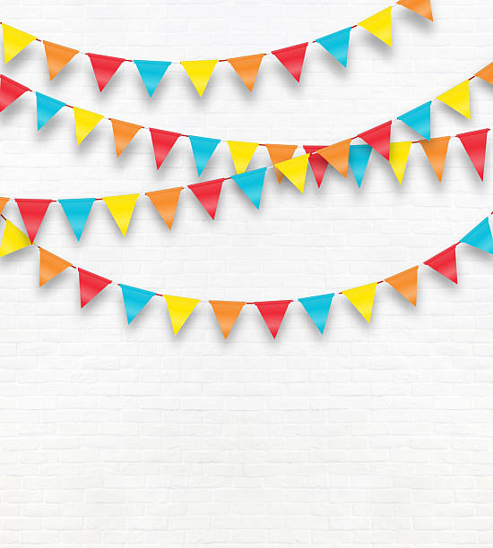 istock Colorful flags hanging party on white wall background 2208623272