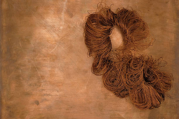 Close-up of dark red thread abstract background.