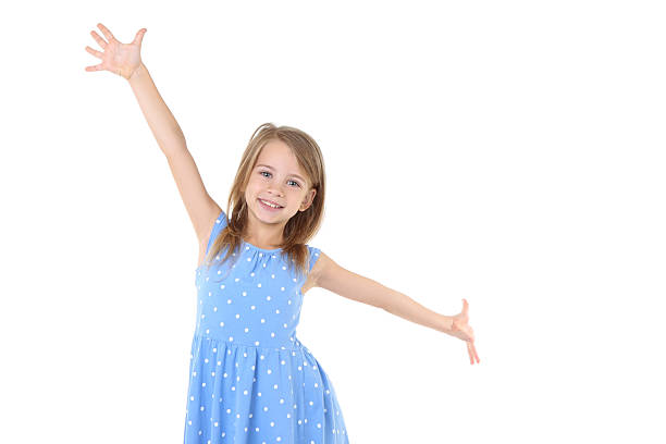 a toddler in a pink cloud of a dress runs like an airplane png, isolated,