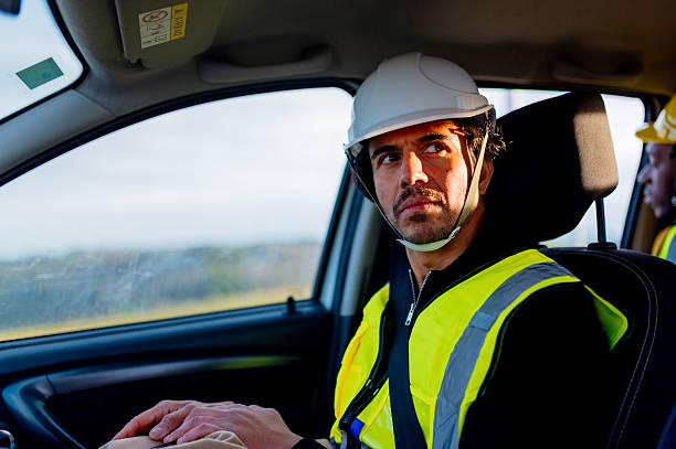 istock Power station workers arriving at work in company car 2208627729