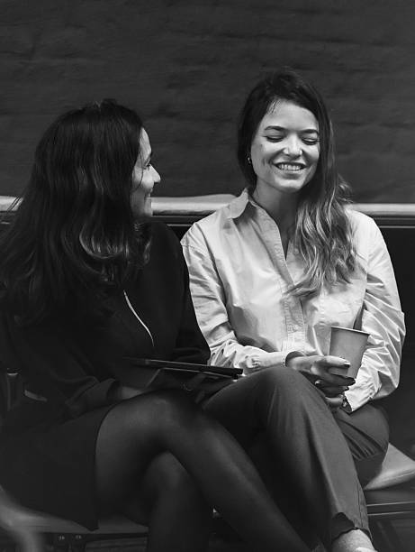 istock two woman in conversation indoors 2208628270