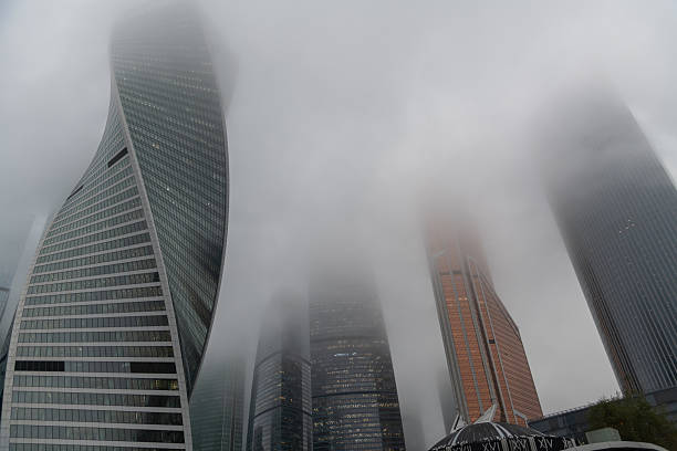 istock Skyscrapers enveloped in fog creating a mystical urban landscape 2208633357