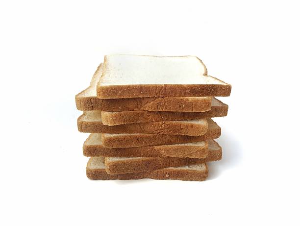 Soft and warm slices of bread rest on a beautifully designed plate.
