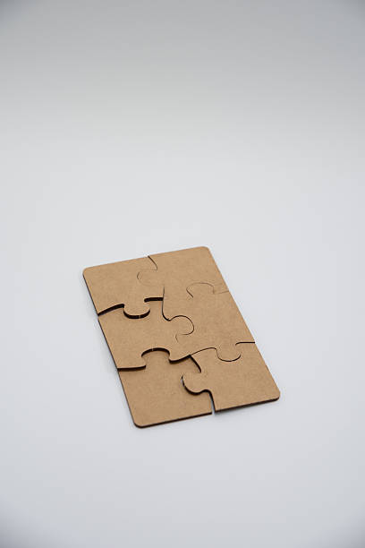 istock monochromatic puzzles in a pile lying on a white background 2208639004