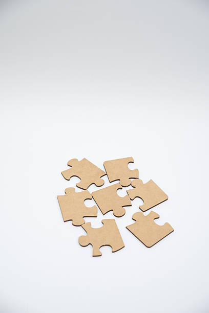 istock monochromatic puzzles in a pile lying on a white background 2208639005
