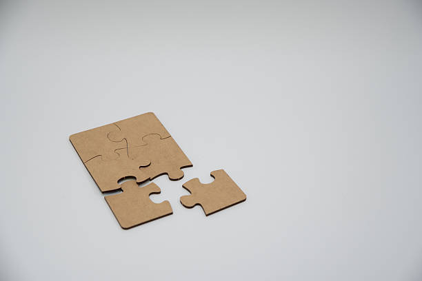 istock monochromatic puzzles in a pile lying on a white background 2208639006