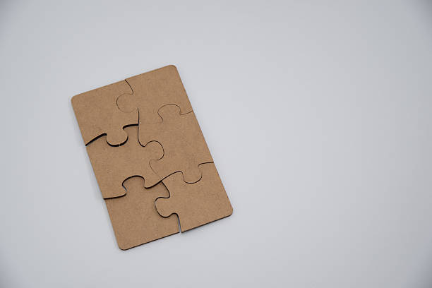 istock monochromatic puzzles in a pile lying on a white background 2208639008