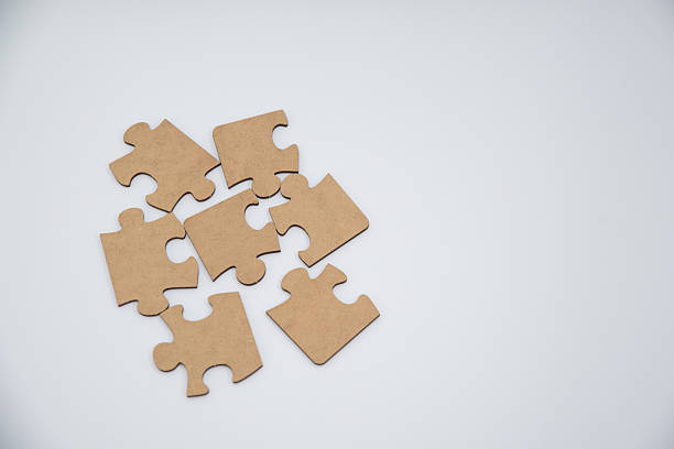 istock monochromatic puzzles in a pile lying on a white background 2208639010