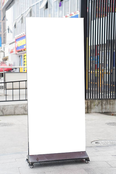 white blackboard advertising sign or customer stopper at sidewalk cafe