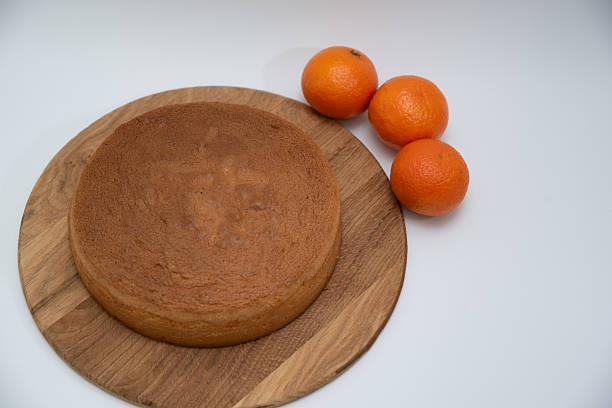 istock Homemade round sponge cake baked on a white background 2208640378