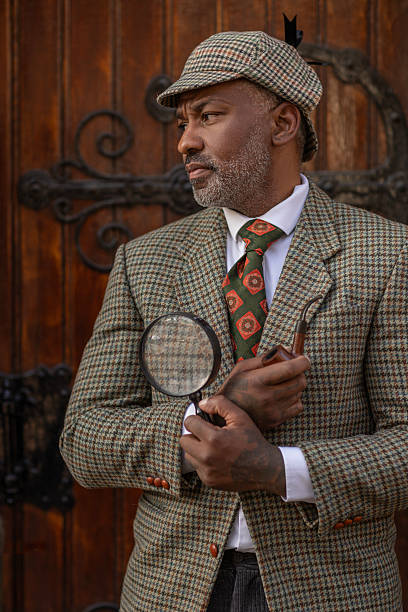istock Handsome senior black man dressed as a classic private detective 2208641093