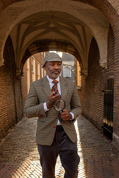 istock Handsome senior black man dressed as a classic private detective 2208643116