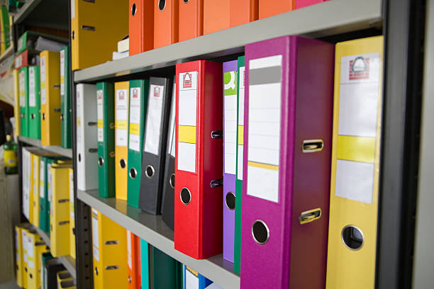 istock Office folders with documents on shelves in the office. Business concept. 2208644753