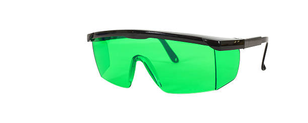 istock Construction, repair, tools - Green safety glasses 2208646087