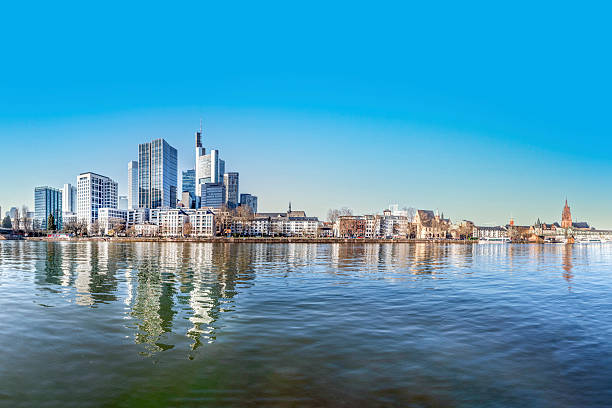 istock view to modern skyline of Frankfurt wit skyscraper and. with river Main in foreground 2208661967