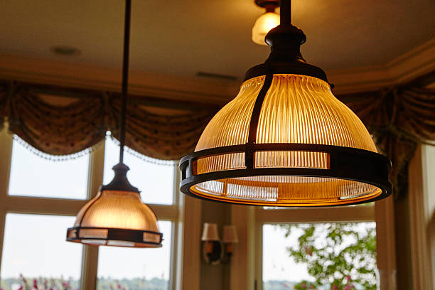 istock Elegant Pendant Lights in Designer Interior, Warm Ambience 2208663357