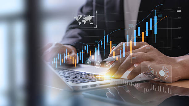 istock Businessman analyzing financial technology data for investment integration using laptop in modern office, visualizing digital charts, market trends, and fintech insights for economic strategy. 2208668212