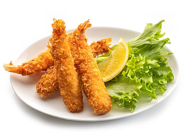istock plate of breaded torpedo shrimps 2208675869