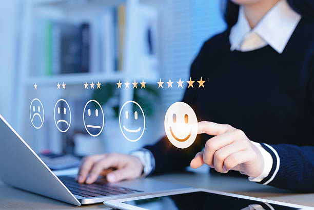 istock Customer review satisfaction feedback survey concept. User give five-star rating on feedback interface, excellent customer satisfaction. emoticons different levels of feedback, customer experience, 2208680138