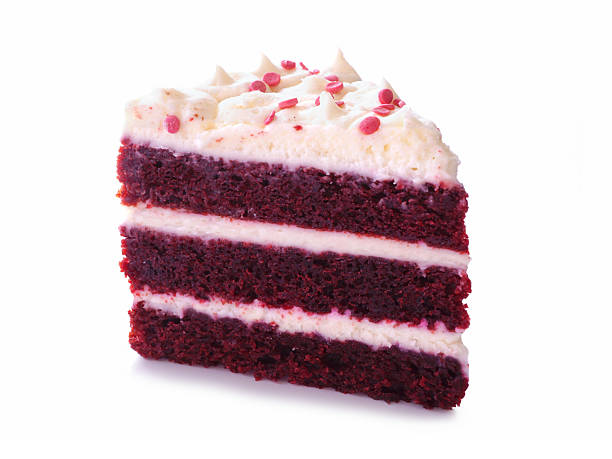 istock Red velvet cake slice isolated on a white background. Three tier cake with cream cheese frosting. 2208684189