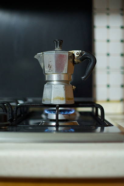 istock an old functional italian moka coffee machine on gas stove 2208686710