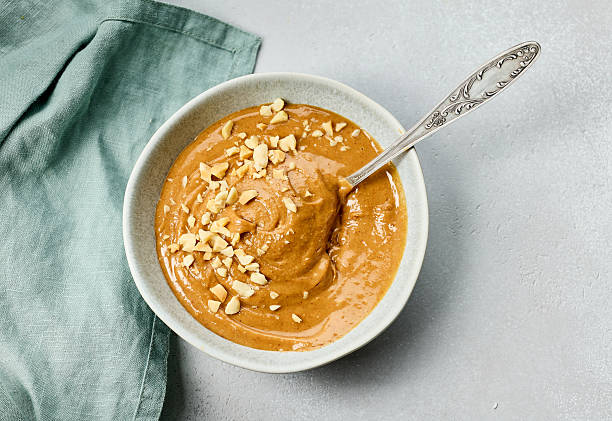 istock bowl of thai peanut sauce 2208689044