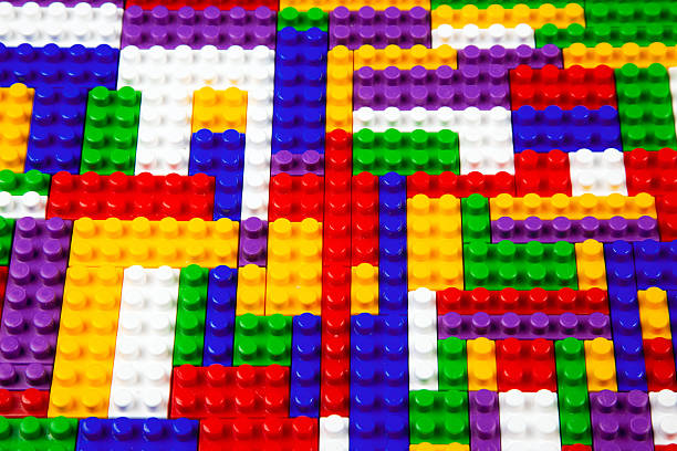 istock Abstract background texture of colored constructor blocks. Background of colorful plastic part of constructor. Pile of colored toy bricks. 2208689230
