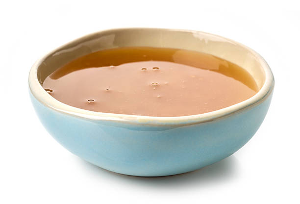 istock bowl of honey 2208690111