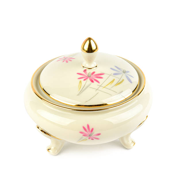 Porcelain vintage sugar bowl isolated on white background.