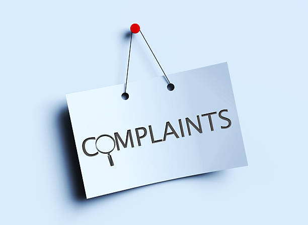 istock Complaints And Magnifying Glass Hanging Paper 2208699118