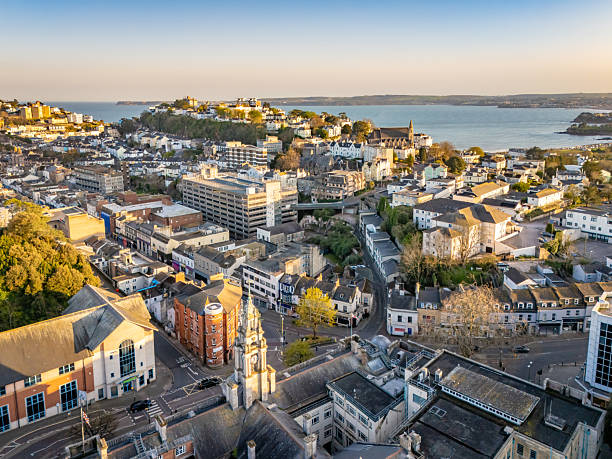 istock Setting sun over Torquay town centre to sea view 2208699981